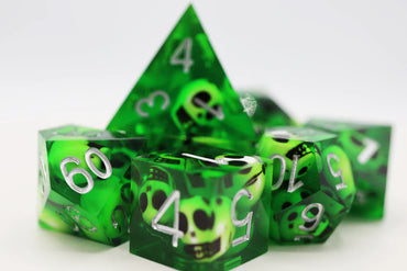 SHARP EDGE RESIN RPG DICE SET - GREEN SKULLS